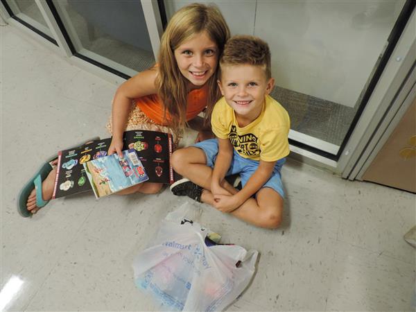 two students on the floor